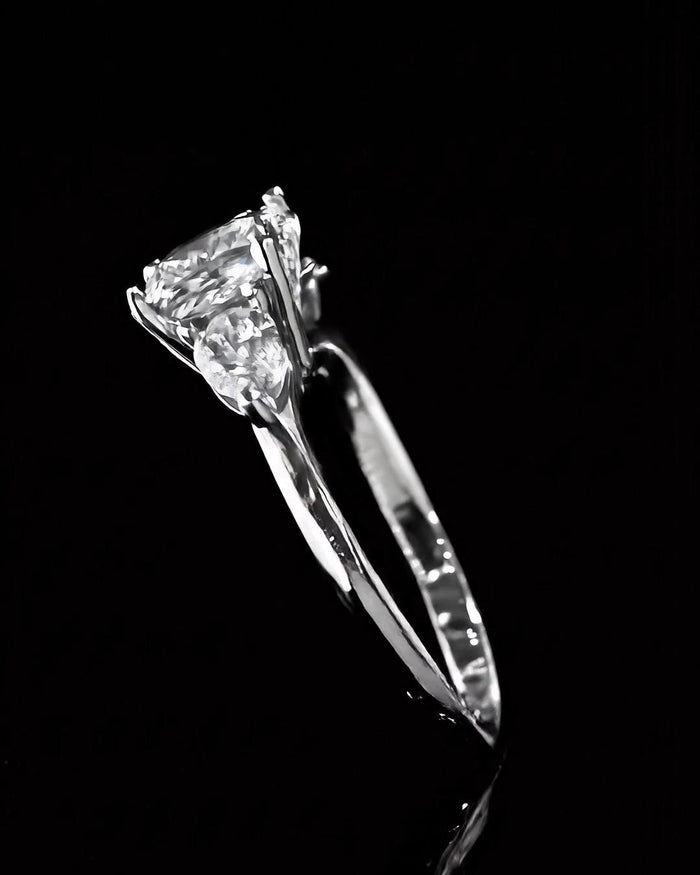 Engagement ring with a hand-set center stone, side view